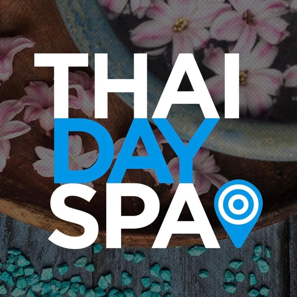 Thai Day Spa logo over a bowl of frangipani and teal stones